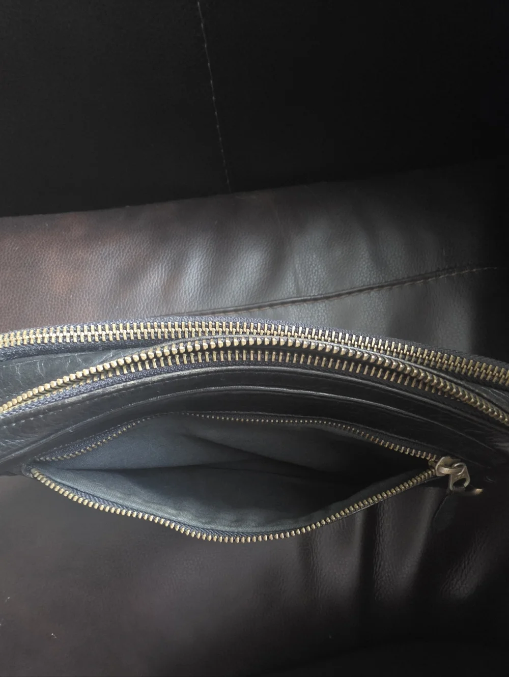 Valentino Garavani Black Leather Bag: Clutch, Dopp, or Organizer